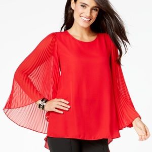Red high-low bell sleeve blouse